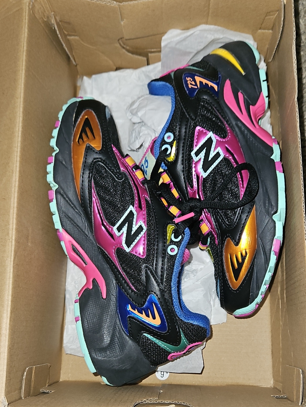 New Balance Black Athletic Trainers with Pink, Gold & Mint Accents